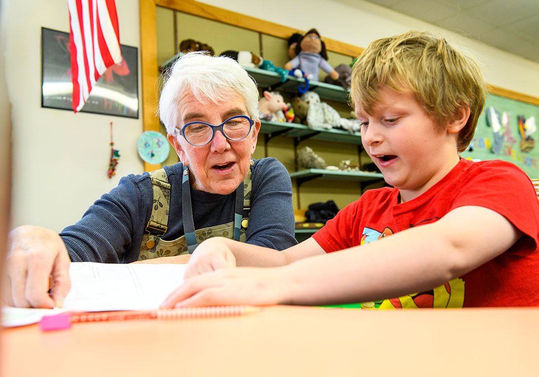 teacher with a student
