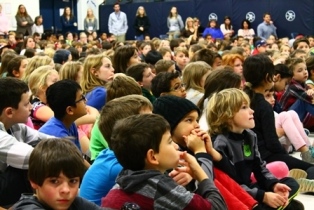 A group of kids at an assembly